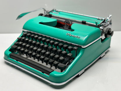 Olympia SM3 Typewriter with Turquoise Bag - A Harmonious Blend of Classic and Contemporary