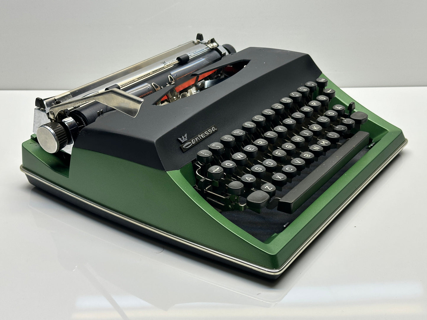 Adler Contessa Deluxe Typewriter - Black Cover and Green Body, QWERTY Option, Refurbished with Black Bag