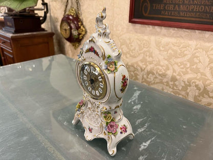 Antique Capodimonte Porcelain Quartz Clock in immaculate condition, showcasing exquisite craftsmanship and elegant floral detailing.