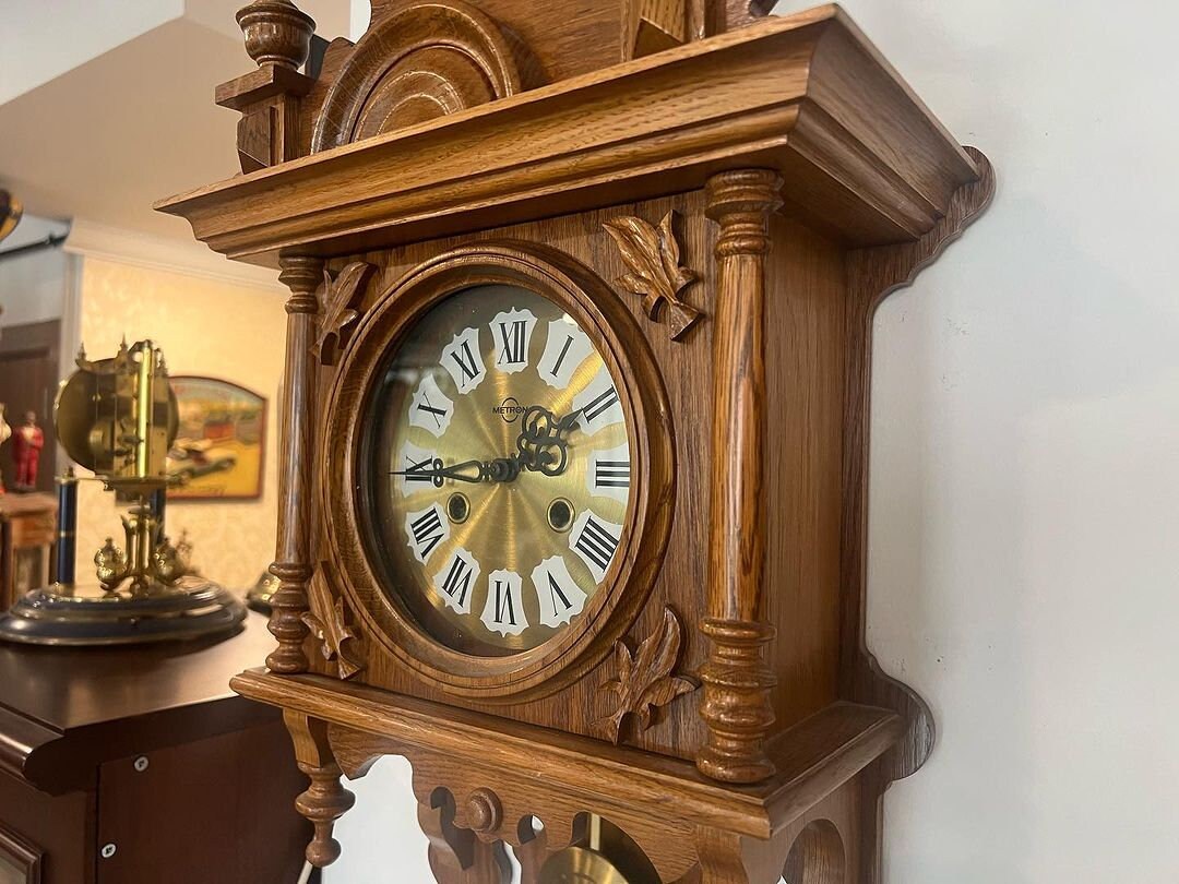 Collectible Antique German Metron Solid Wood Wall Clock in perfect condition with Roman numerals displayed prominently
