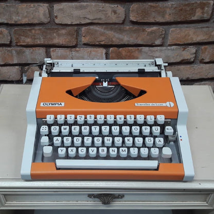 Olympia Traveller Deluxe Typewriter - Fully Functional, Vibrant Orange, and Includes a Stylish White Bag