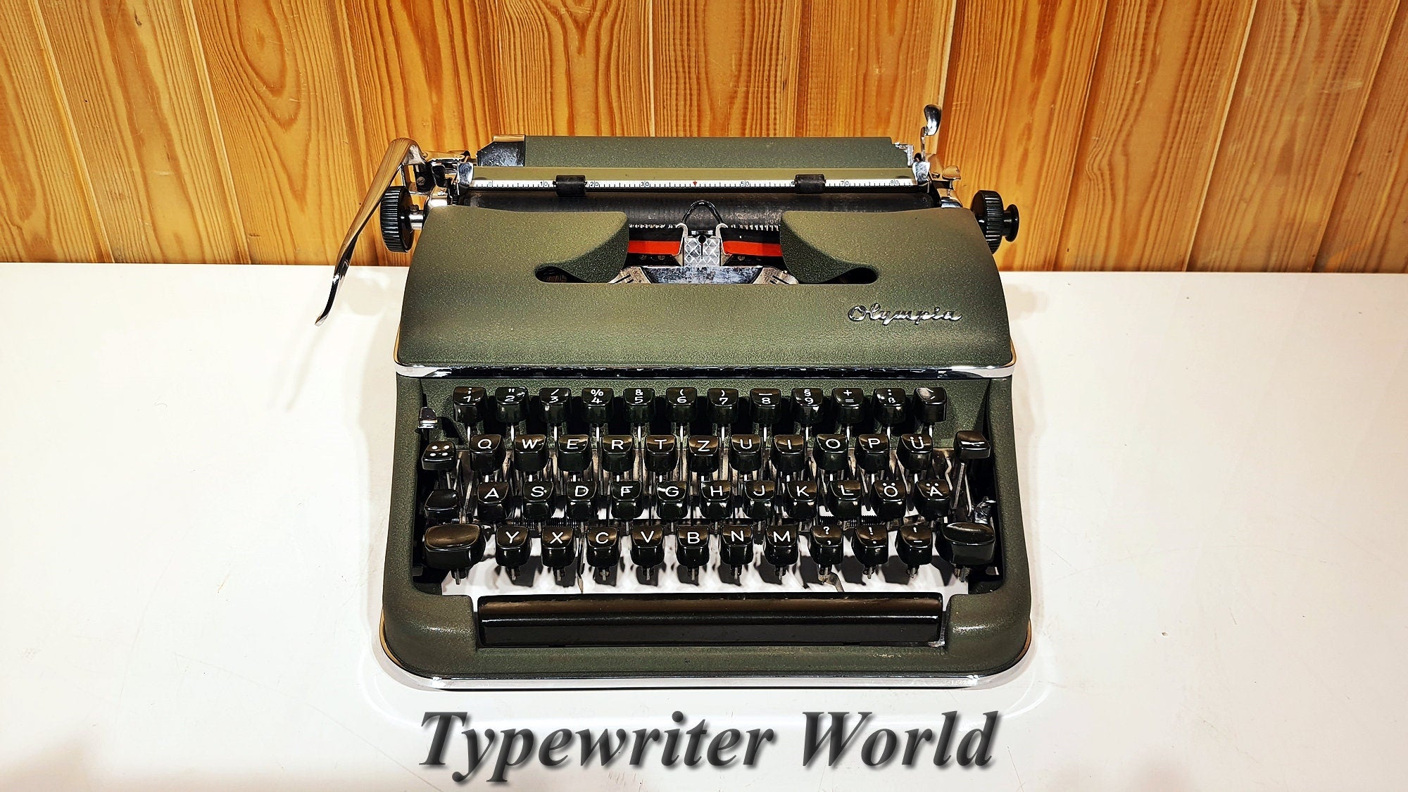 Vintage Olympia Deluxe Typewriter good with case.