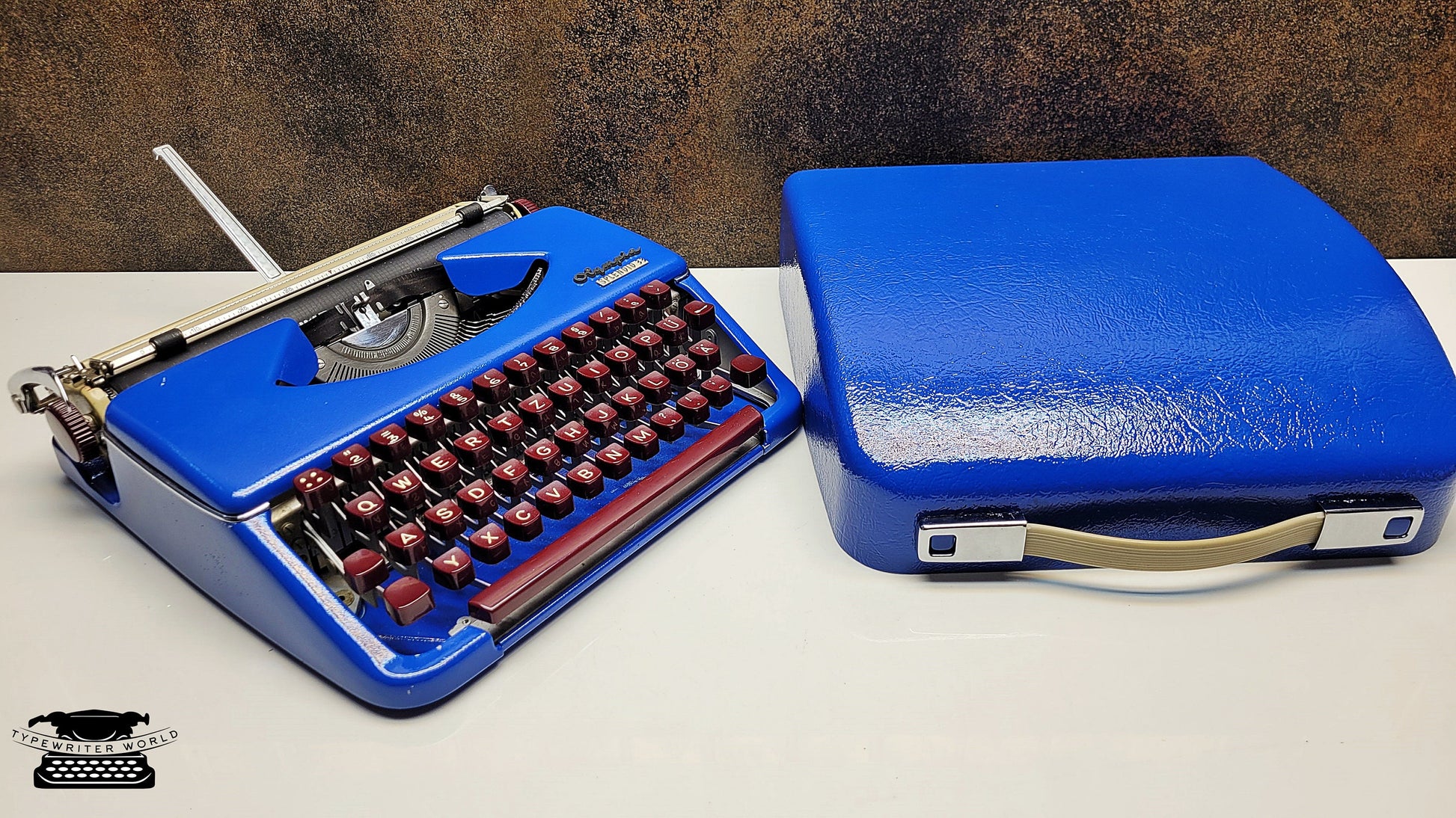 German-Made Olympia Splendid 33/66 Blue Typewriter with Mechanical Burgundy Keyboard and Case | Fully Refurbished Rare Writing Machine